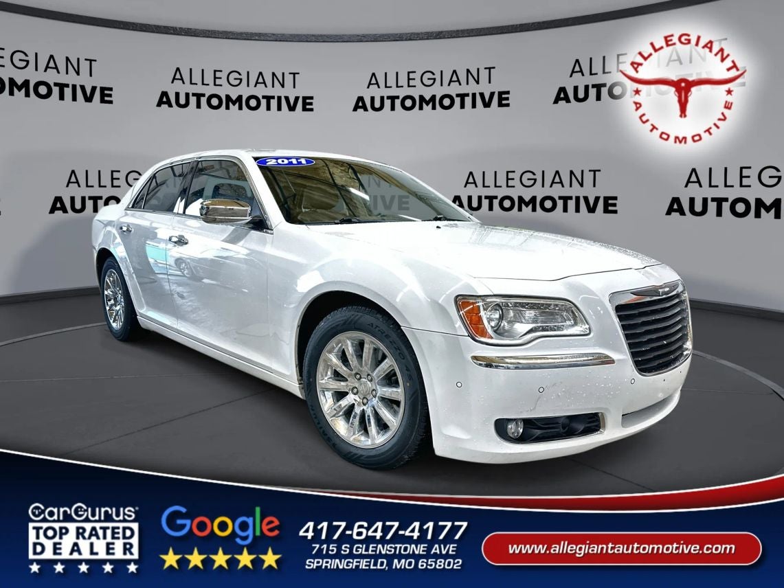 2011 Chrysler 300 300C Sedan 4D in White — front three-quarter view