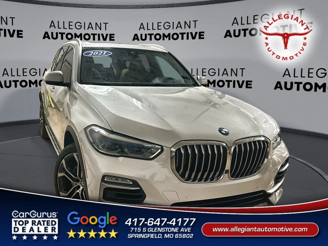 2021 BMW X5 sDrive40i Sport Utility 4D in White — front three-quarter view