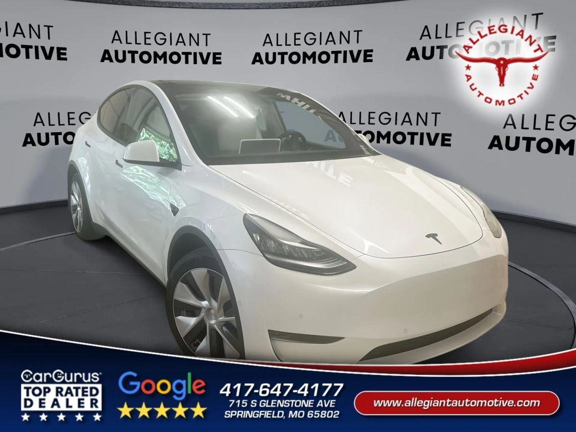 2021 Tesla Model Y Long Range Sport Utility 4D in White — front three-quarter view