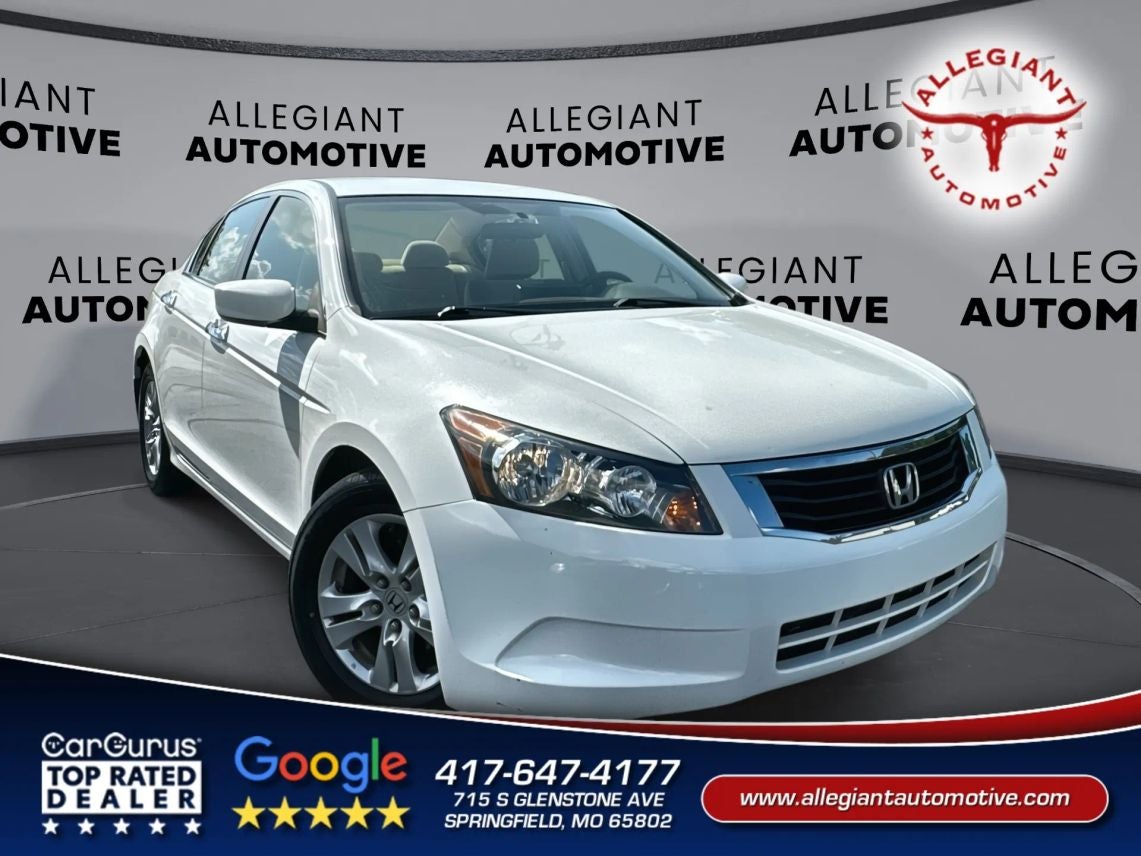 2009 Honda Accord LX-P Sedan 4D in White — front three-quarter view